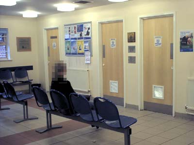 Reception area showing the doors to the consulting rooms.